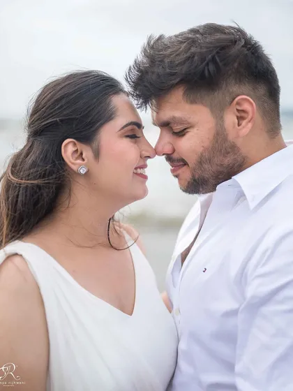 A quiet, tender moment nose-to-nose. These close-up portraits are perfect for capturing the deep connection and affection between a couple.