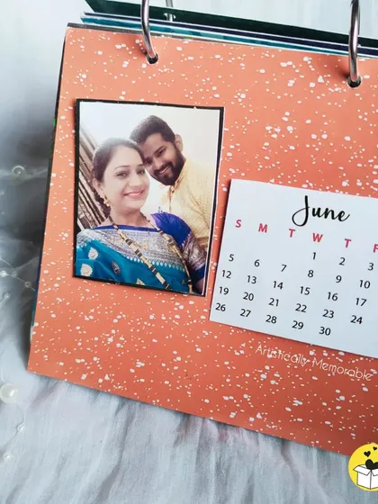 The June page of a colorful ring-bound calendar. Each month has a different vibrant background.