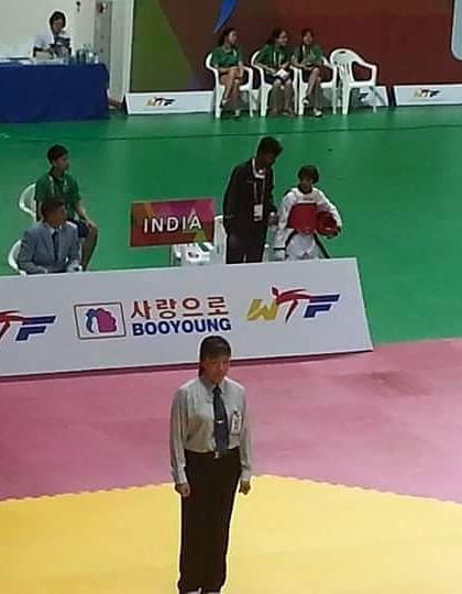 One of my young students representing India on the competition mat at a World Taekwondo Federation event. We start training champions from a young age.