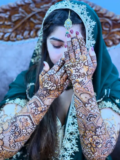 Your story, your mehndi. I love personalizing designs, like adding "Naveed ki Dulhan" for this beautiful bride, making her henna a unique reflection of her love story.