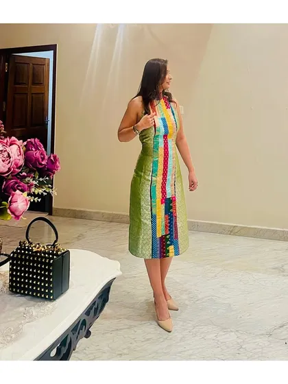 Our co-founder Pooja celebrating Diwali in a vibrant, custom-designed patchwork brocade dress.