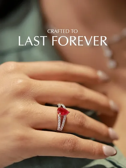 Crafted to last forever. This ring showcases a pear-shaped ruby set on a split-shank diamond pavé band. The unique shape of the gemstone combined with the delicate sparkle of the diamonds makes for a promise of enduring beauty.