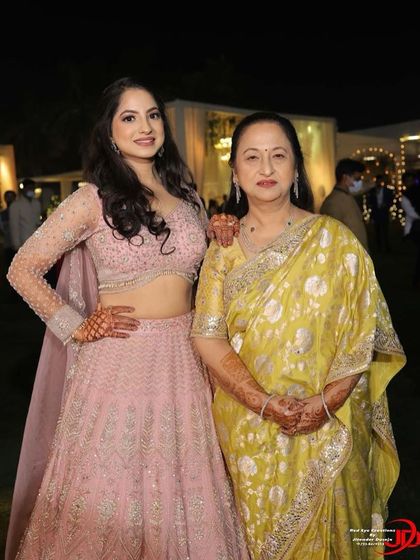 A beautiful mother-daughter duo. Both are looking elegant with soft and subtle party makeup.