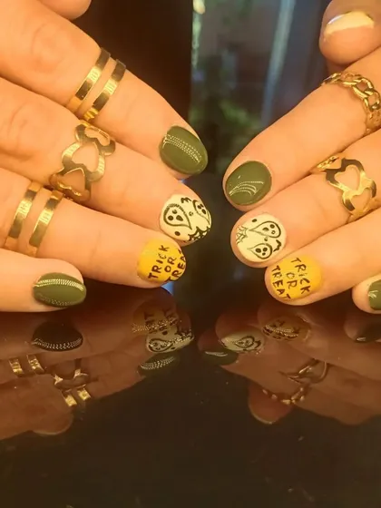 A full view of the creative Halloween nail art.