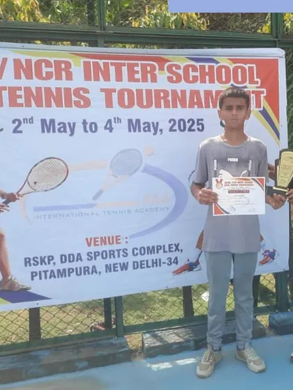 An ILTA player receives his award at the Delhi/NCR Inter-School tournament. These events are crucial for gaining competitive experience against a wide range of players.
