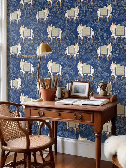 The same beautiful Kalamkari wallpaper used in a home office or study area. It demonstrates how traditional patterns can create a sophisticated and inspiring environment for work or reading.