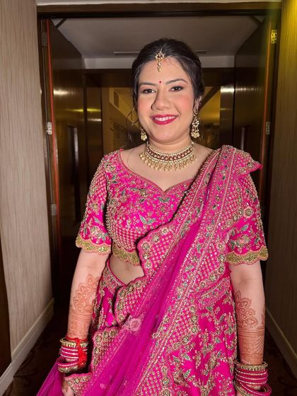 A happy and radiant client. Her makeup is minimal yet glowing, proving that you can look stunning with a light touch.