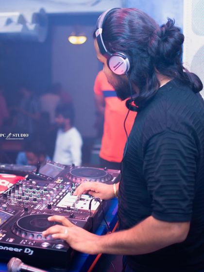 These shots capture me in my element, from different angles and at various events. Each one is a glimpse into my life as a music maker, focused on the craft and connecting with the crowd.