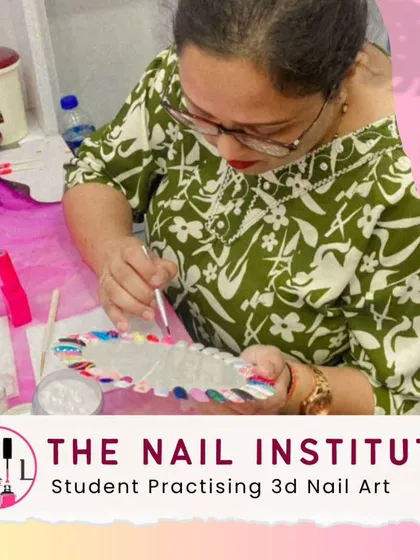 This student is practicing 3D nail art on a color wheel, experimenting with different shapes and embellishments.
