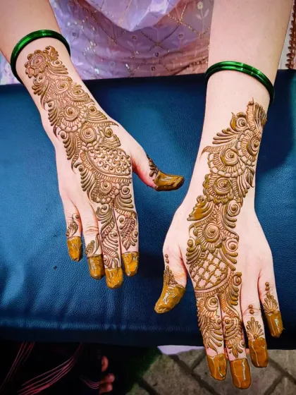 A rich and detailed Arabic design with a mix of paisley, floral, and geometric elements, perfect for a festive celebration.