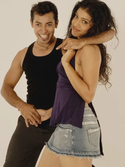 A vintage photo from one of our first photoshoots. We've been dance partners for over 15 years, and this picture is a fun reminder of where our story began.