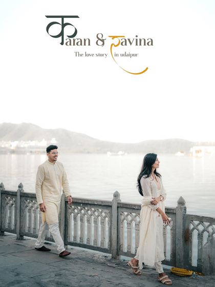 A candid moment of the couple walking along a beautifully carved stone railing in Udaipur. This shot captures a natural interaction against a backdrop of classic Rajasthani architecture.