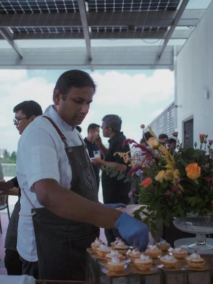 Another view of me at a buffet station, ensuring every detail is perfect.