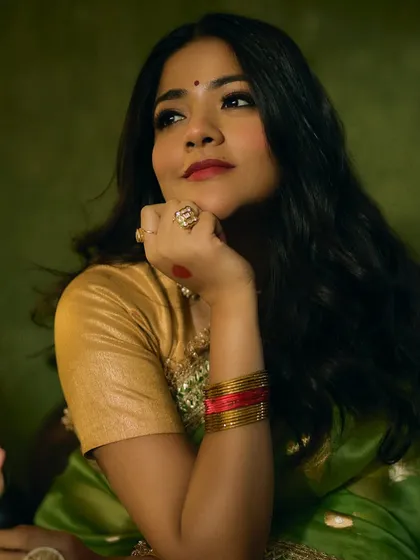 Another beautiful image from the 'Prem Patra' shoot. The makeup features a classic red bindi and a soft red lip, evoking the style of old Hindi cinema heroines.