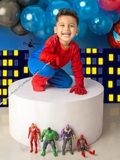 Thwip! This little hero shoots a web, showing off his superhero moves. These action shots are so much fun to create and capture.