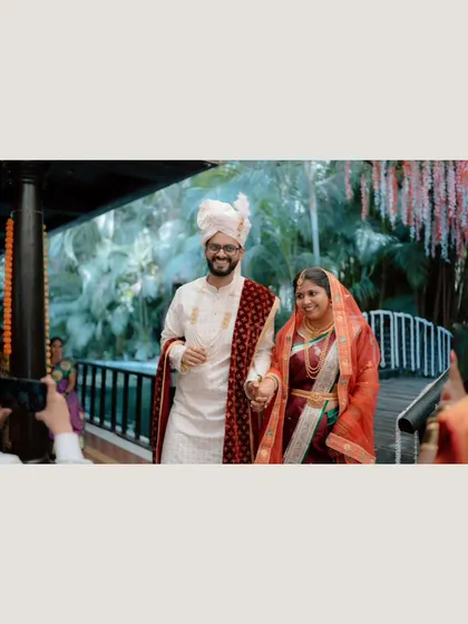 The bride and groom's grand entrance together over a bridge at the wedding venue. It’s a beautiful, cinematic start to their ceremony.