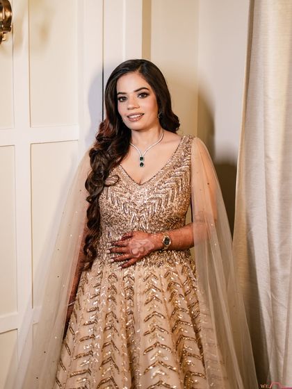 A stunning portrait from Ashima’s engagement night. The airbrush makeup creates a flawless canvas for this glamorous look.