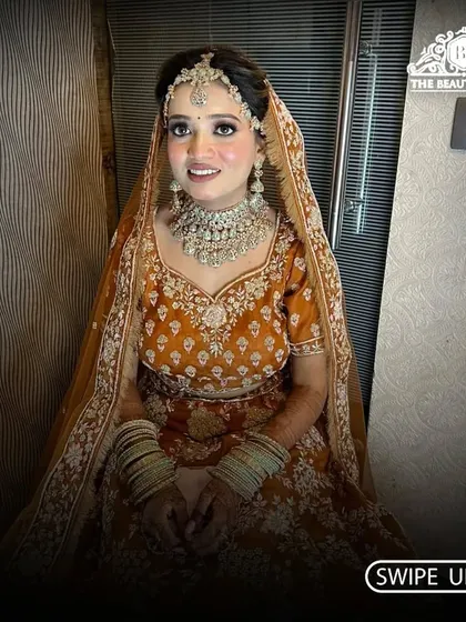 Our beautiful bride smiling, showcasing her complete wedding day look. We love being a part of these happy moments.