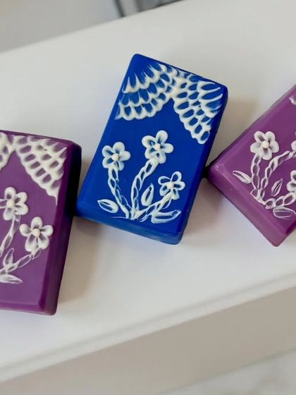 A different angle of the brush embroidery soaps, showing the fine details.