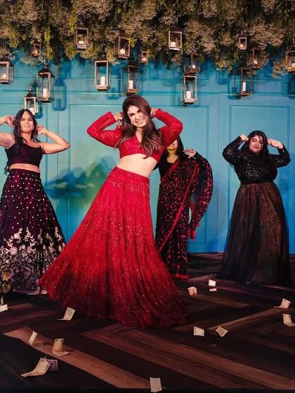 The bride and her squad owning the stage. We choreograph formations that look great from every angle, ensuring the performance is a visual treat for the audience.