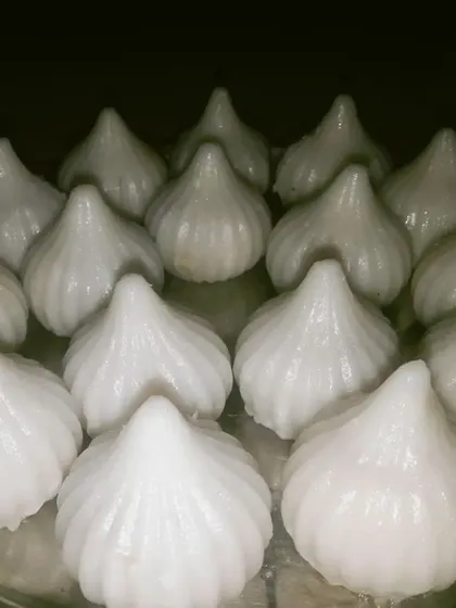For Ganesh Chaturthi, our KitchenStars prepare traditional Ukadiche Modak. These steamed sweet dumplings, filled with coconut and jaggery, are a festive delicacy we are proud to offer, showcasing authentic Maharashtrian flavors.