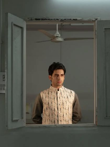 Stay cool and stylish this summer with our linen kurta pajama jacket set, featuring a unique tie-dye print for a touch of personality.