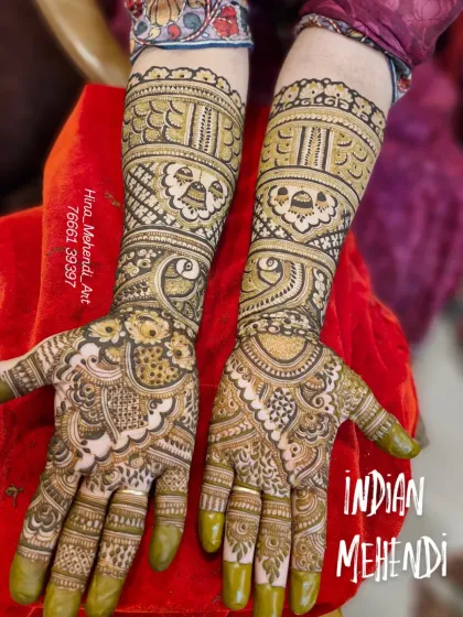 This design features beautiful peacock and bell (ghungroo) motifs, perfect for a bride who loves traditional Indian art. The shading creates a lovely depth.