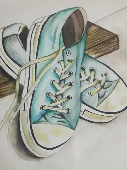 A realistic watercolour painting of a pair of sneakers. In my advanced classes, we work on challenging subjects like this to master shading and texture.