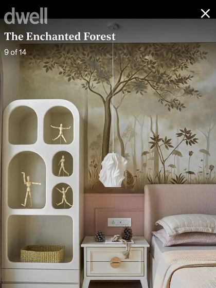 Another shot from the Dwell feature, showing how the forest mural integrates with the room's decor to create a cohesive, nature-inspired sanctuary.