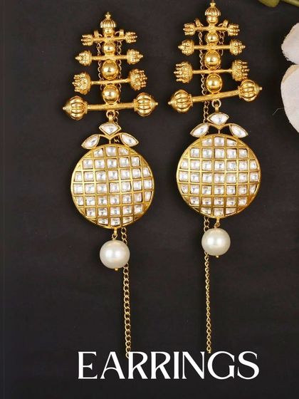 Why repeat when you can rent? This image highlights our unique collection of earrings, perfect for when you just need one statement piece to complete your outfit.