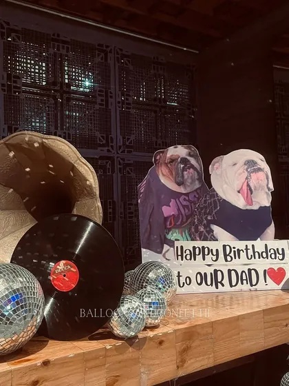 Even the dogs got in on the action with this adorable custom cutout wishing their dad a happy birthday.