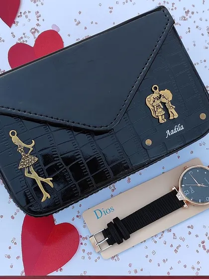 This elegant black version of the sling bag and watch combo is perfect for any occasion. The bag is personalized with a name and two beautiful charms.