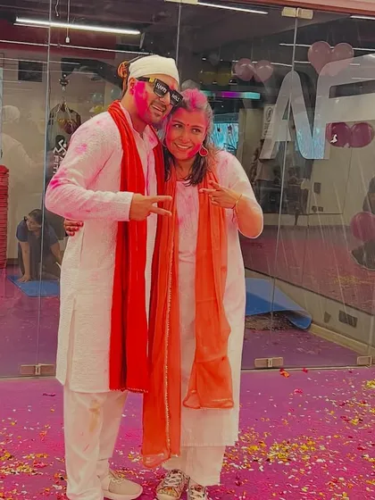 A colorful throwback moment from our Holi celebration. Sharing a happy picture with a member of my AF fam, covered in gulal.