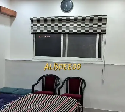 A collection of images from a rooftop study room project in Rohini. The photos show the stylish exterior at night, the clean and simple interior, and the quality of the finishing touches.