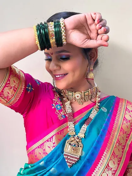 A happy and radiant bride. The makeup is designed to highlight her smile and the beautiful features of her face.