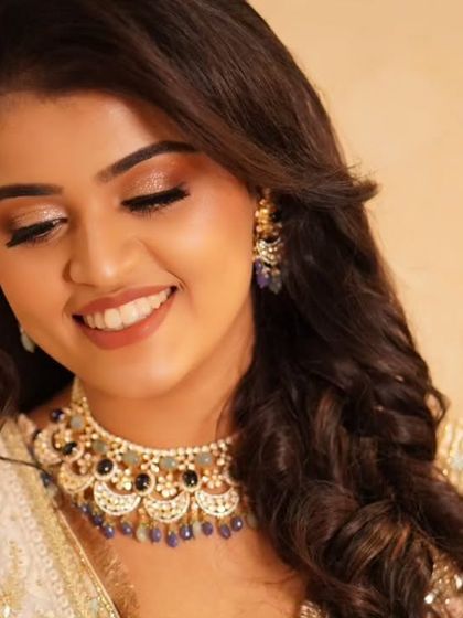 Payal's dreamy reception look, captured in a moment of quiet joy. The sparkling eyes and soft smile are the perfect finishing touches to her glamorous ensemble.