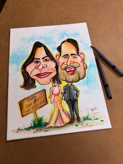 A classic "Happily Ever After" moment captured for a special couple. This handmade piece with a simple, beautiful background makes for a timeless wedding or anniversary gift.