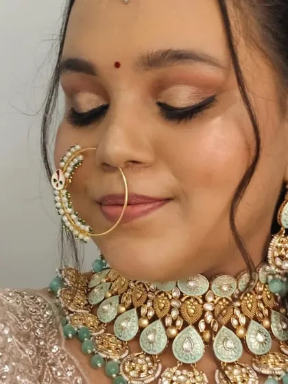 A close-up on the oversized nath (nose ring) and choker from our mint green jewellery set. These pieces can elevate any bridal outfit.