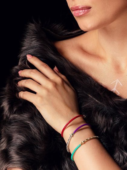 A detailed shot from the Pure Facets campaign, focusing on the colorful and modern bracelets from the collection.