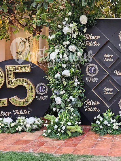 Celebrating a major corporate milestone like a Silver Jubilee requires decor that is both elegant and impactful. I designed this entire setup, from the branded backdrop to the floral arrangements, to honor the company's legacy with style.