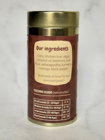 The back of my Assorted box shows the full list of wholesome ingredients I use across my range, plus a simple feeding guide based on your dog's size, from small to giant breeds.