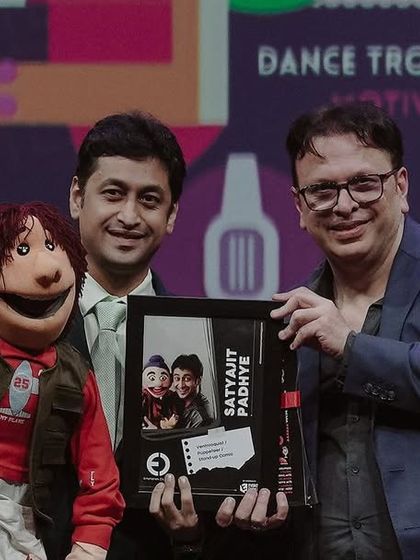 Being felicitated by industry veterans at the WOW Awards is always a humbling experience. Here I am receiving my award with my ever-present partner.