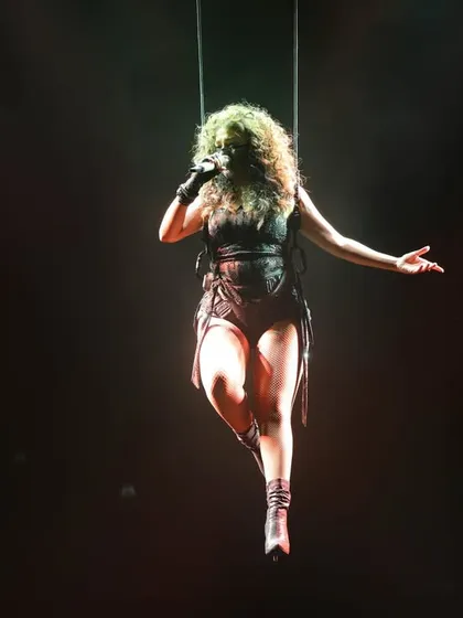 Suspended mid-air, Sunidhi commands the stage. This is a testament to our ability to execute complex and breathtaking production stunts safely and effectively.
