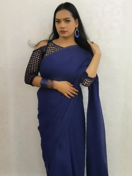 A confident and glamorous pose, perfect for a party or special event.