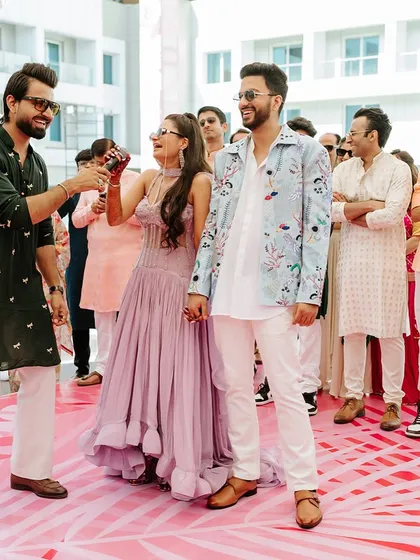 Sharing a fun moment with the bride and groom during their carnival. These are the candid shots that truly capture the spirit of the day.