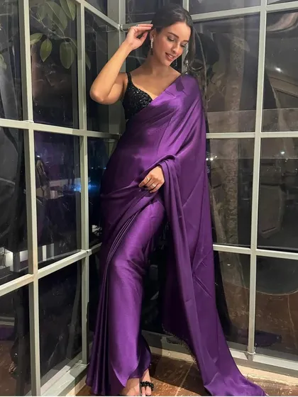 I styled Tripti Dimri in this elegant purple satin saree from Swtantra, paired with a contrasting black sequin blouse. The look is simple, modern, and incredibly chic, proving the power of color and texture.