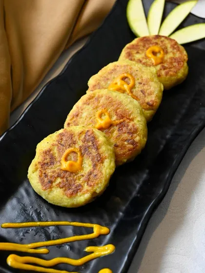 Indulge in the sweet and tangy delight of Khatti Mithi Tikki from our Mango Special Menu. A perfect blend of raw mango and spices.