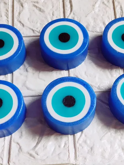 A set of six evil eye soaps, a popular design for gifting.