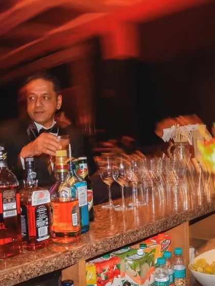 A candid shot of the bar during a busy event. My team works hard to ensure every guest is served promptly and with a smile.