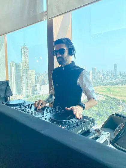 A sundowner session with the Mumbai skyline as the backdrop. I adapt my set for any environment, playing chill house and commercial pop that complements the sophisticated atmosphere of a daytime corporate event or private gathering.